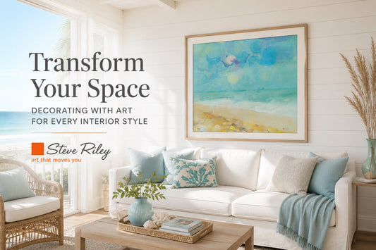 Bright coastal living room featuring Steve Riley's Beachcomber artwork displayed above a white sofa, showing how beach-inspired wall art transforms a modern Australian home.